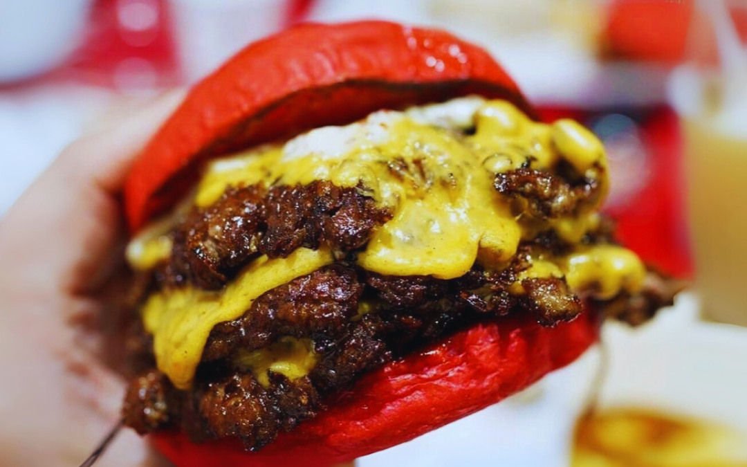 Wulf Burger Allen red bun smashburger with beef tallow fries near the Community Ice Rink on Bethany Drive