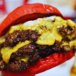 Wulf Burger Allen red bun smashburger with beef tallow fries near the Community Ice Rink on Bethany Drive