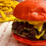 Red Bun Burger with crunchy fries and overloaded grass-fed beef patties