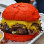 Wulf Burger Richardson red bun smashburger with beef tallow fries near UTD in the Telecom Corridor
