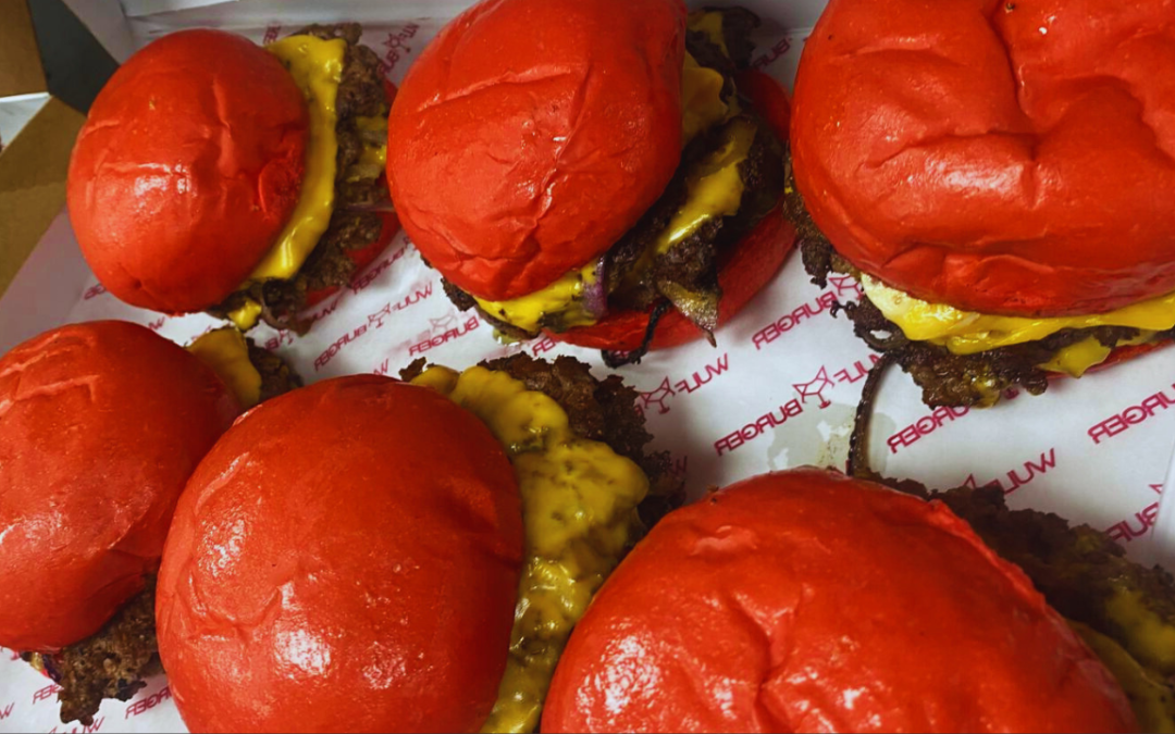 The Wulf Special Burger — red bun Halal beef burger with garlic mustard aioli at Wulf Burger McKinney.