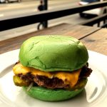Wulf Burger Allen green bun vegan burger with crispy vegan fries near Allen Premium Outlets