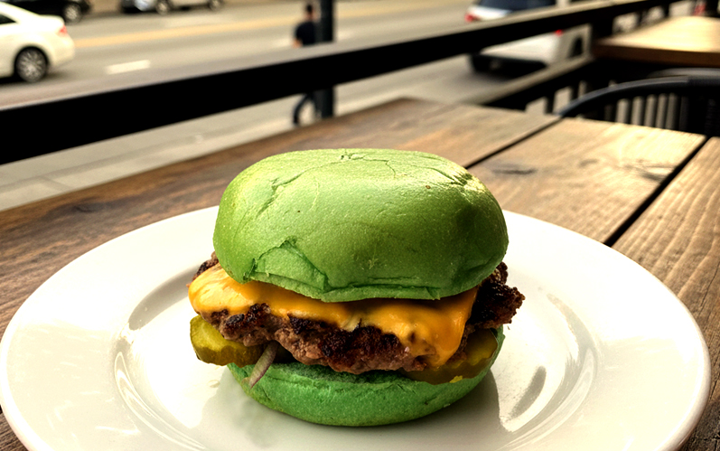 Wulf Burger Allen green bun vegan burger with crispy vegan fries near Allen Premium Outlets