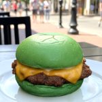 Wulf Burger green bun vegan burgers in Plano with crispy vegan fries near The Shops at Legacy
