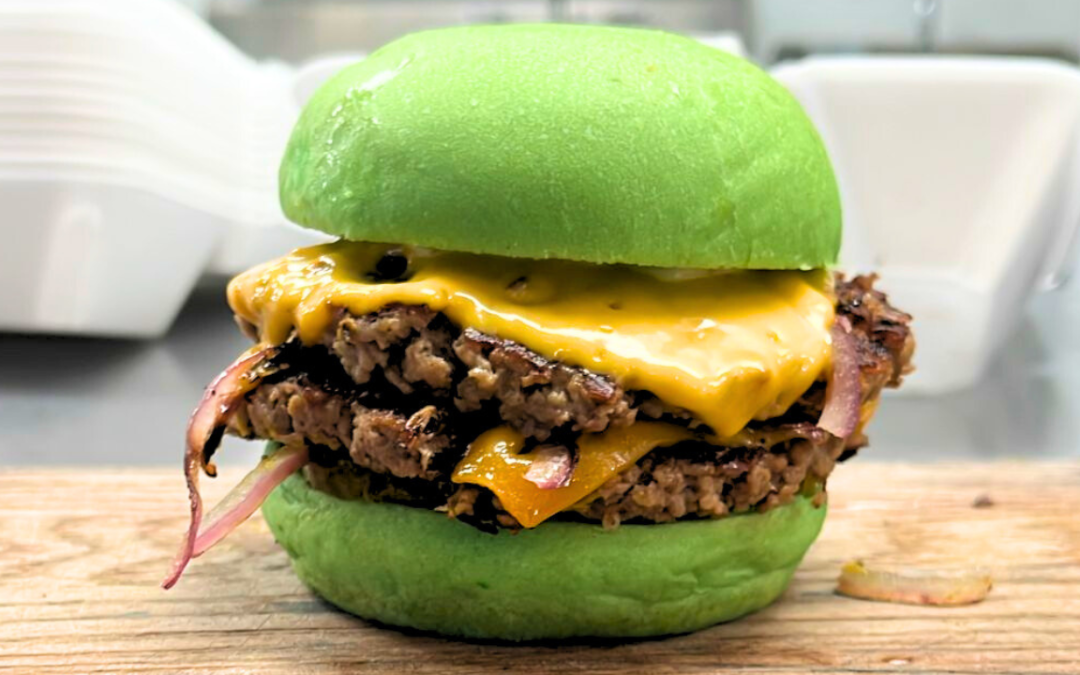 Wulf Burger Richardson green bun vegan burger with crispy vegan fries near Belt & Main in Richardson’s Core District