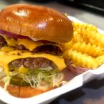 Dallas best local restaurant Wulf Burger red bun burger