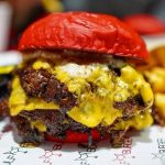 top burger place in Dallas Wulf Burger red bun