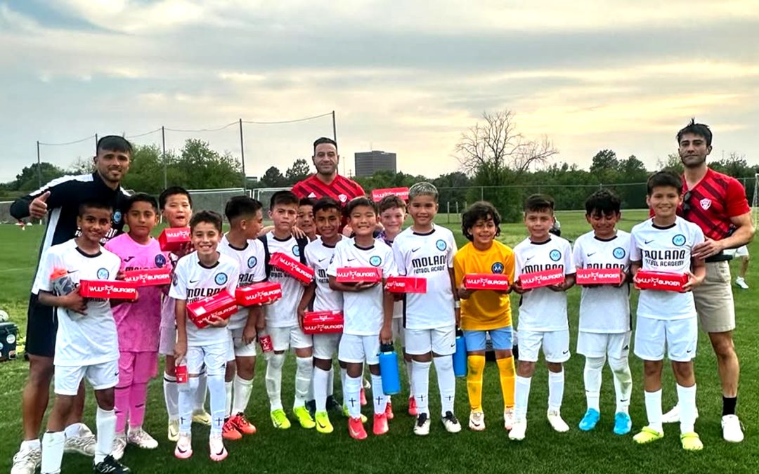 Dallas youth sports teams enjoying post-game meals at Wulf Burger