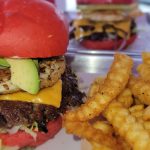 Fully loaded heavyweight burger with double smash patties at Wulf Burger Dallas TX