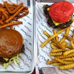Diverse top-tier burgers at Wulf Burger in Dallas TX including protein stacks and classics