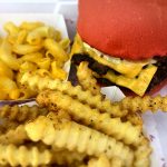 Crispy double smash burger with melted cheese at Wulf Burger Dallas TX