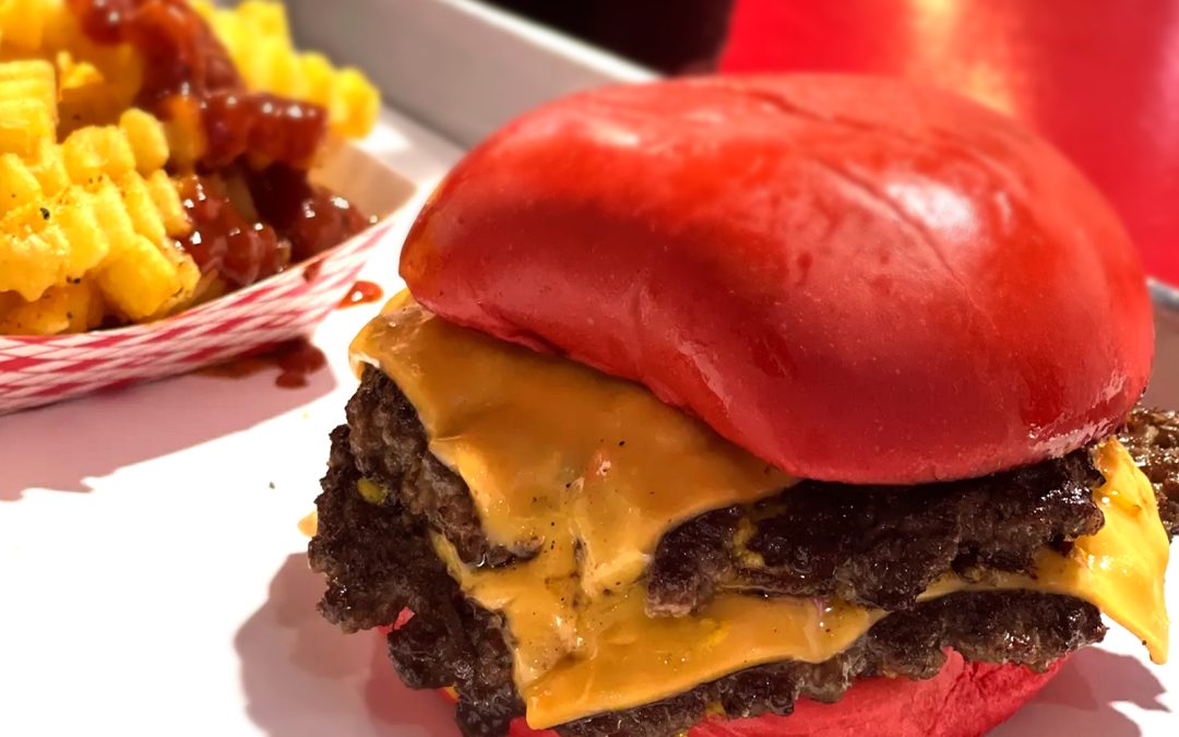 Wulf Burger red and green buns made with beet and avocado extract in Dallas Texas