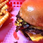 Wulf Burger Protein Stacks with grass-fed beef and beet extract red bun in Dallas Texas