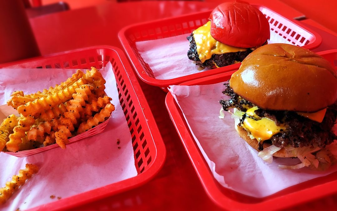 Wulf Burger simple cheeseburger with double American cheese and smash patties in Dallas Texas