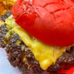 Wulf Burger red bun smash burger trending on Dallas food Instagram